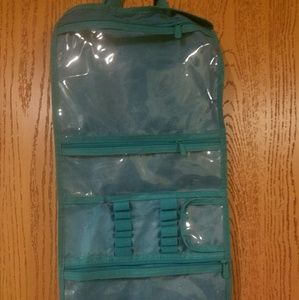 Free with purchase Folded travelers make up pouch